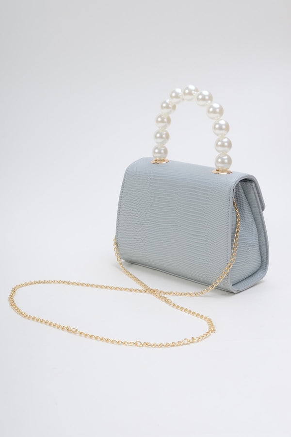 Carraig Donn Pearl Top Handle Clutch Bag in Blue