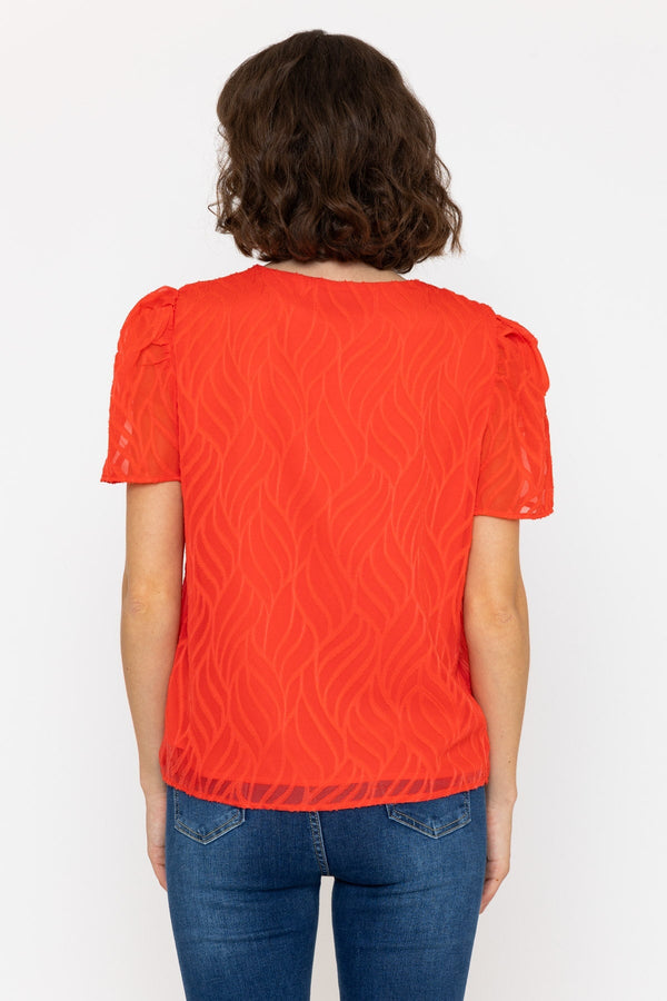 Carraig Donn Short Sleeve Textured V Neck Top in Coral