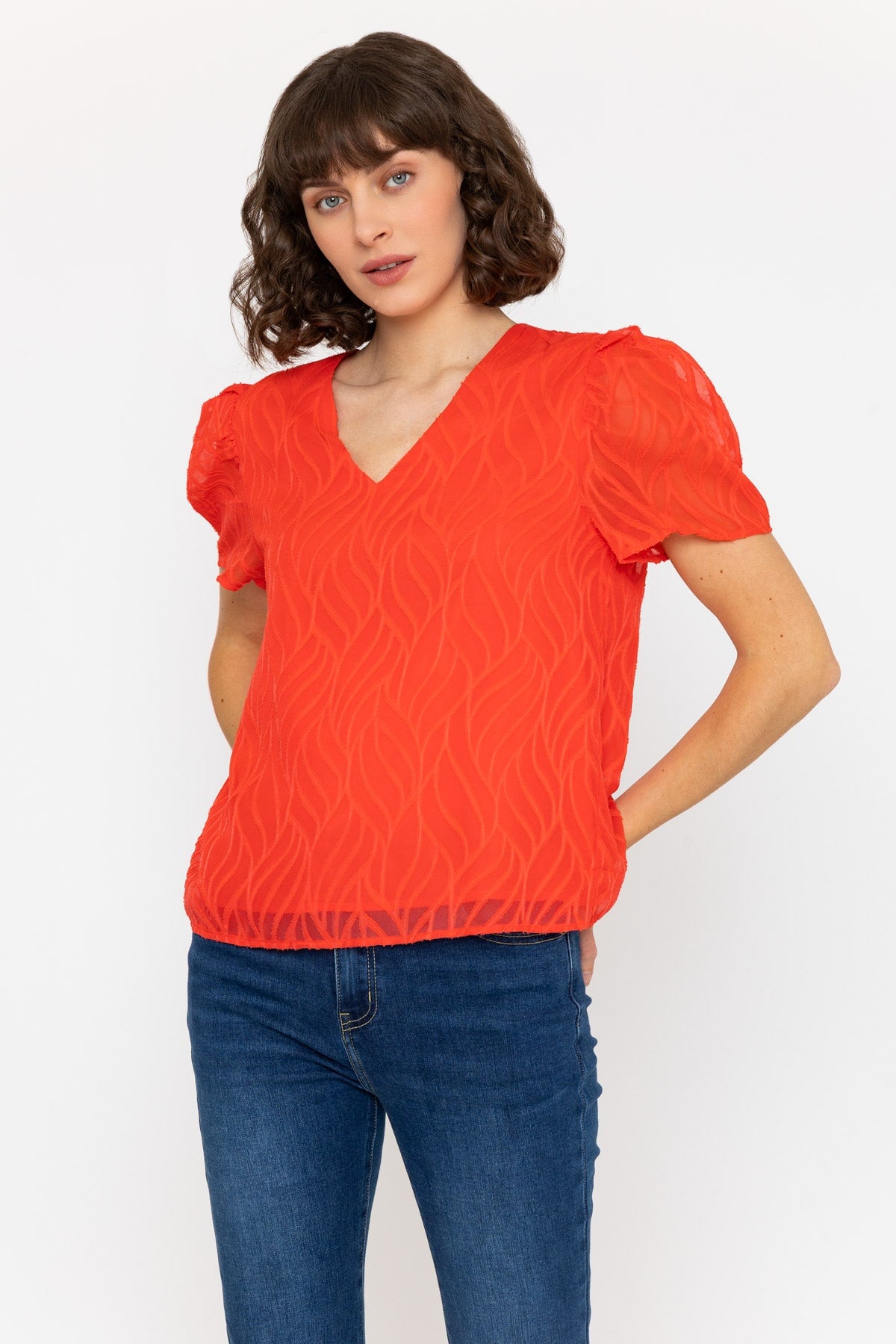 Short Sleeve Textured V Neck Top in Coral